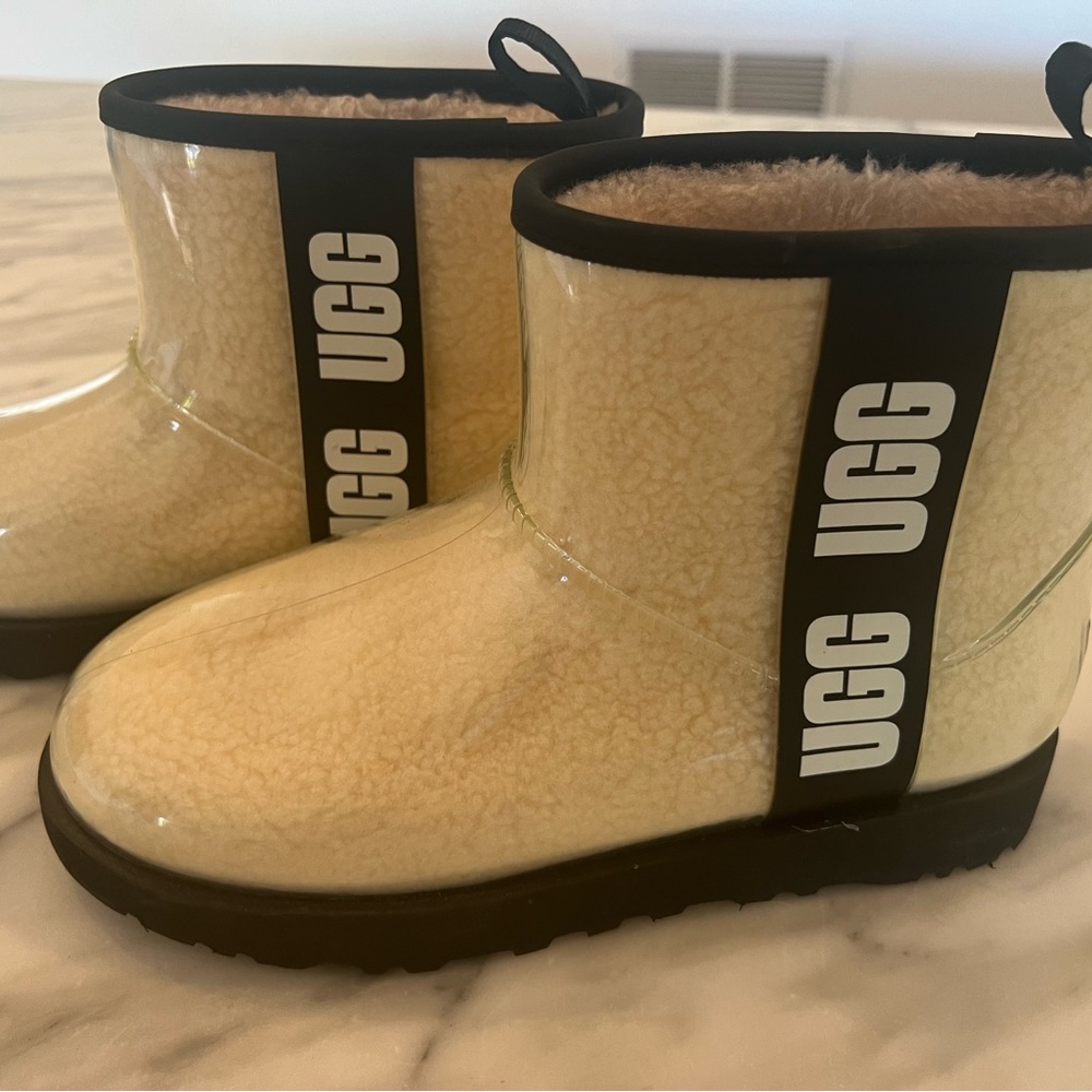 Uggs! Waterproofed and fleece lined. Worn 2 times. Size 7